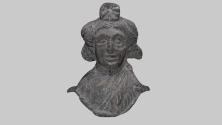 Applike in Form eines Bacchus