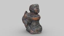 Statuette eines Knaben mit Vogel